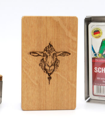 Schafkopf auf einen Eichendeckel graviert